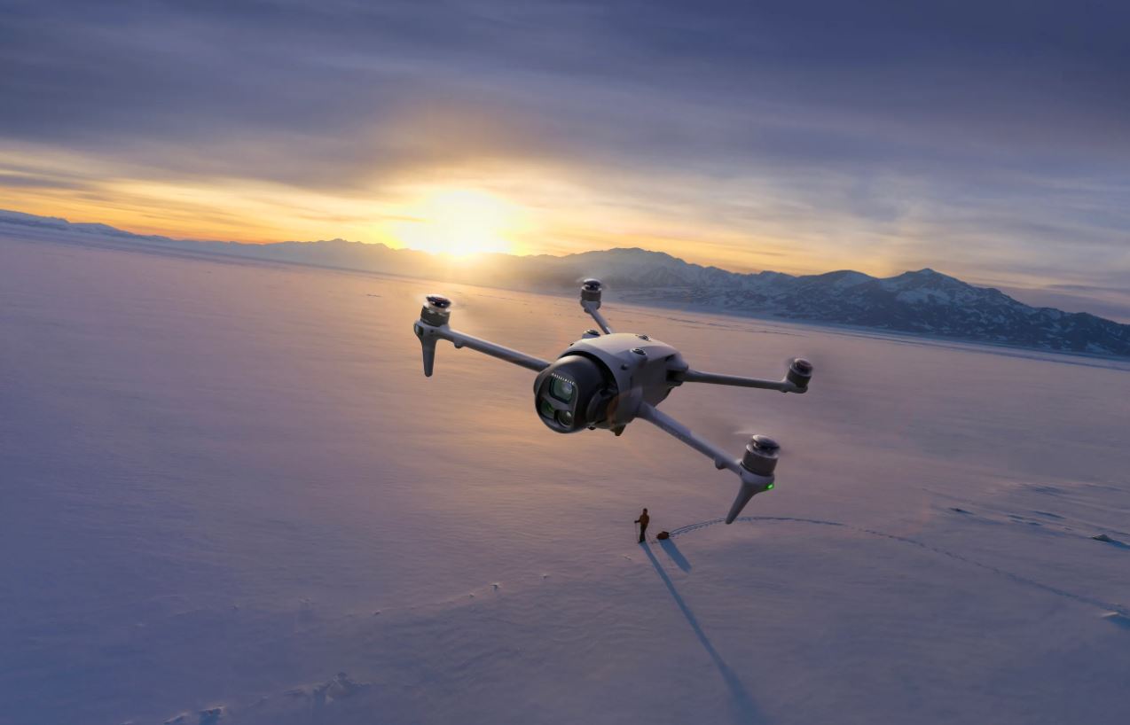 DJI Mavic 4 Pro flying at sunset