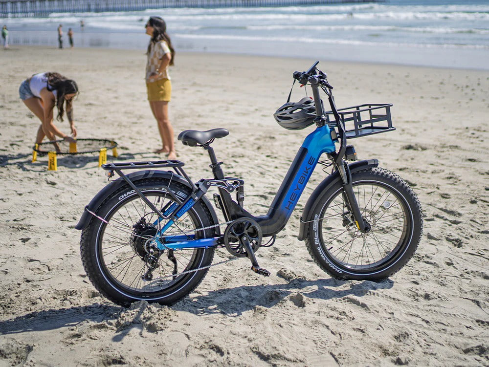 Heybike Horizon blue folding electric bike on beach
