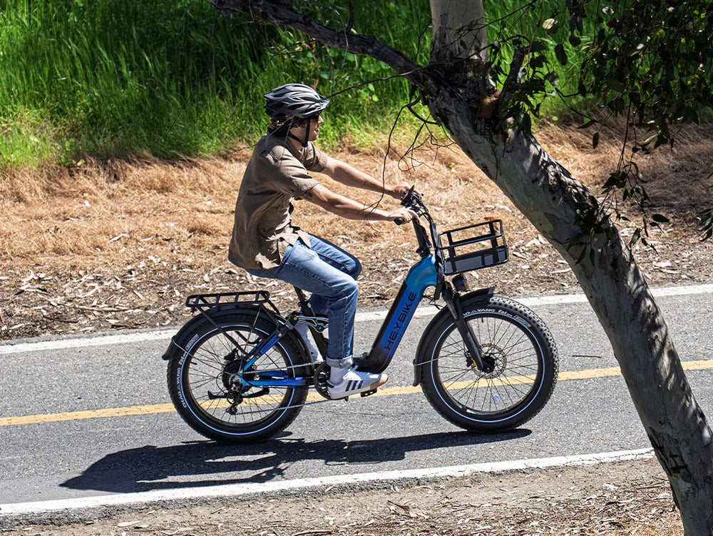 Heybike Horizon blue full suspension e-bike on dirt path