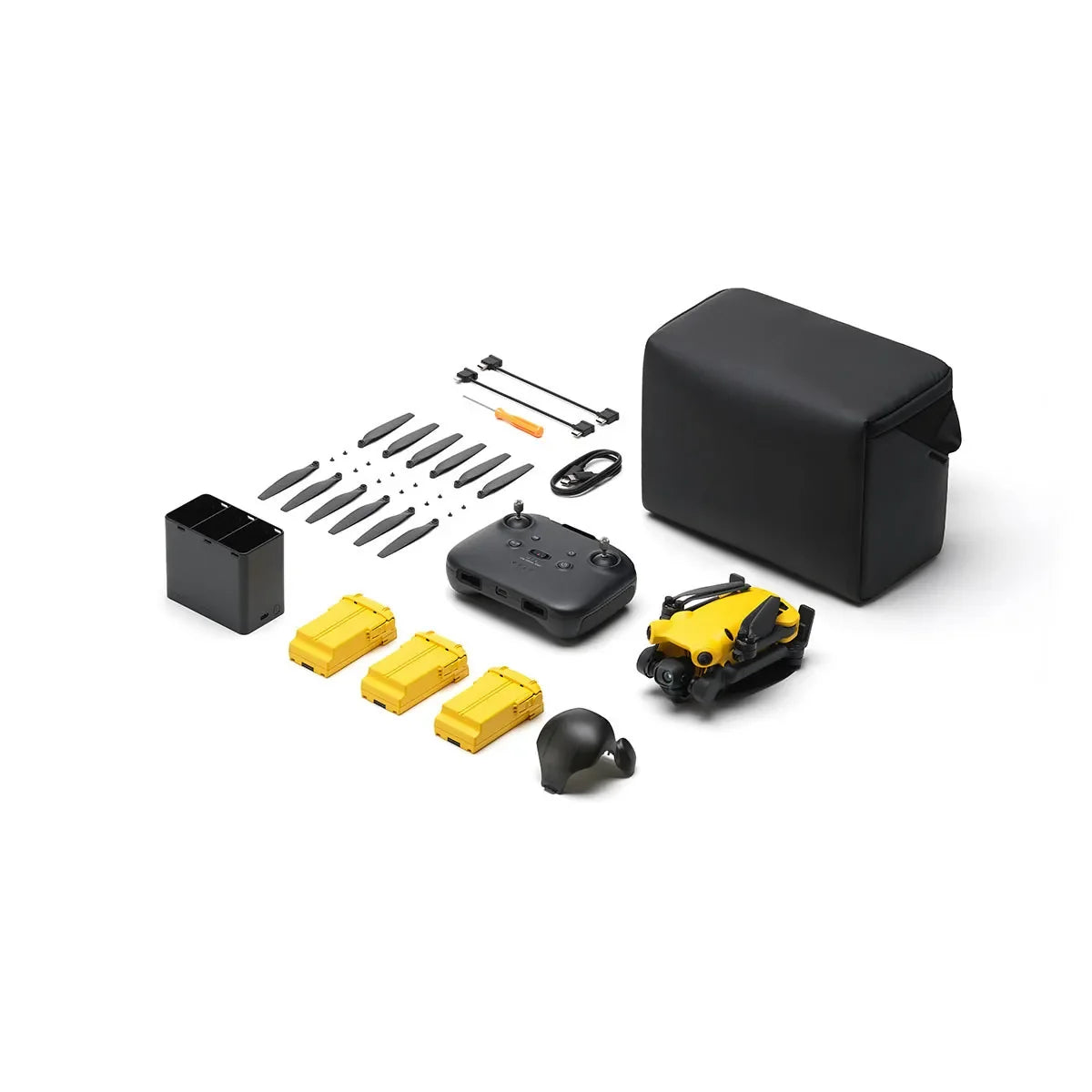Skyrover X1 Bundle Yellow package contents with batteries, propellers, charging hub and accessories